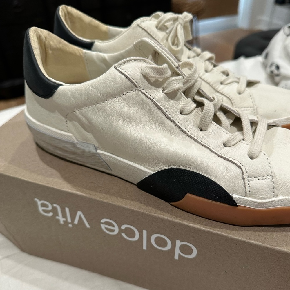 Dolce Vita Zina sneakers, cream with black and silver accents. No box.